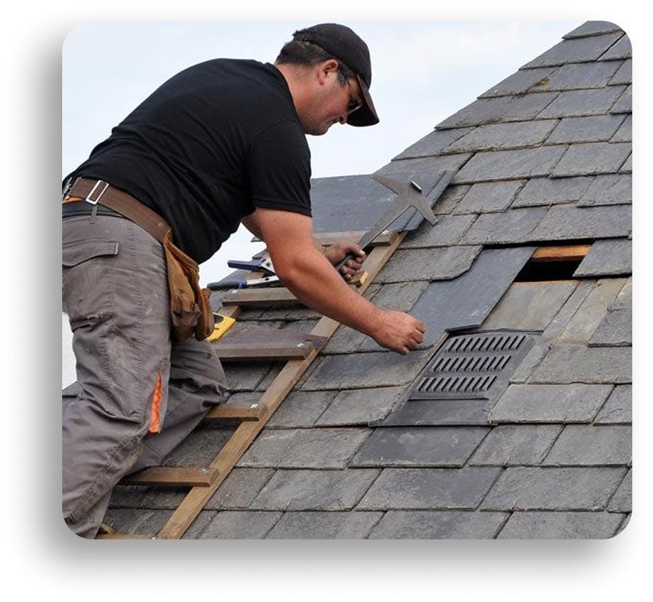 A person in a black shirt and cap from American Patriot Roofing is repairing a slate roof with tools, standing on a wooden ladder beside an open vent, showing expertise in commercial roofing across North Texas.