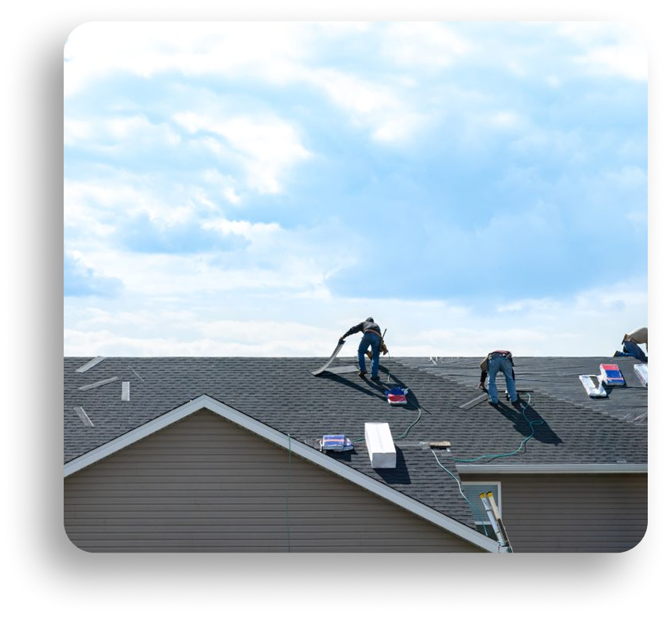 Three workers in safety gear are installing or repairing shingles on a sloped house roof under a partly cloudy sky. Roofing materials and tools are spread around them, showcasing expert roofing repair in North Texas.